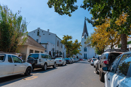 Dutch reformed church in the city centre of Stellenbosch. View from the front from the street. Sunny summer day with high sunの写真素材