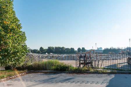 Demolition site at an athletic center in Ljubljana during renovation. Concrete stadium bleachers are...