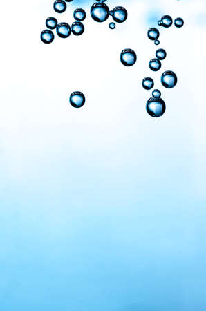 Gradient background with bubbles in a corner の写真素材