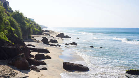 Peacefull tropical beach with cliffs in Varkala, Kerala, India.

の写真素材