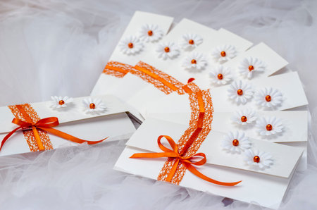 Unique handmade wedding invitations on tulle fabric の写真素材