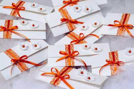 Unique handmade wedding invitations on tulle fabric.の写真素材