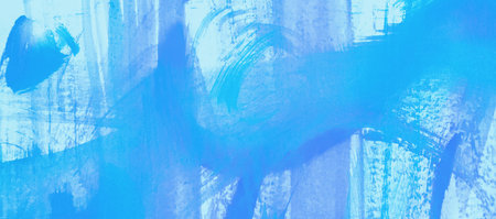 A textured paper with a cool watercolor mottled background in shades of blue.の写真素材