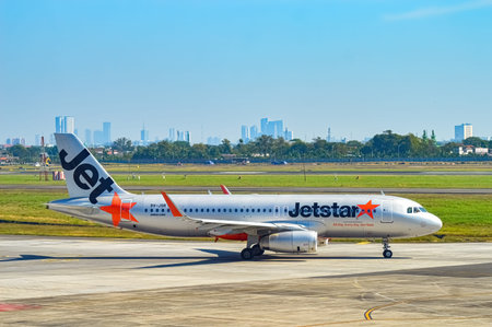 An Airbus A320 aircraft belonging to Jetstar airline is heading towards the runway via the taxi way...