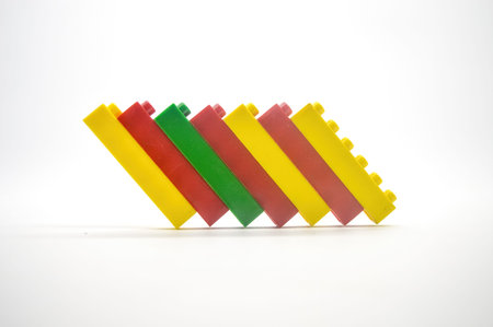 a collection of colorful constructive disassembly games arranged isolated on white background