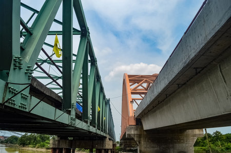 two large bridges, steel truss bridge and arch bridge, cross the river. Low Angleの写真素材
