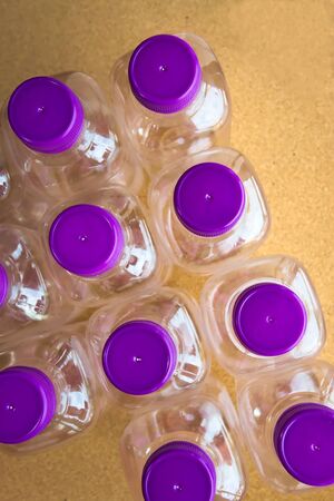Empty bottle on the wood background.の写真素材