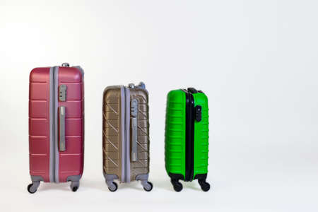 Set of colored suitcases for travel and vacation.の写真素材