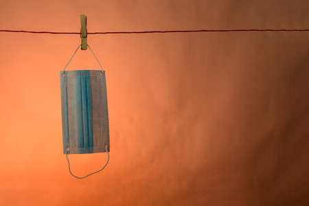 Protection mask against virus isolated on a brown backgroundの写真素材