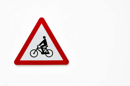 Traffic sign - Danger Bicycles - On white background.の写真素材