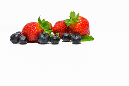 Group of fresh fruits - various colors - on white background.の写真素材
