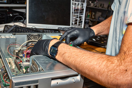 Computer technician working in workshop