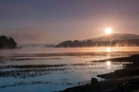 Magnificent sunset in the landscape of the swamps.の写真素材