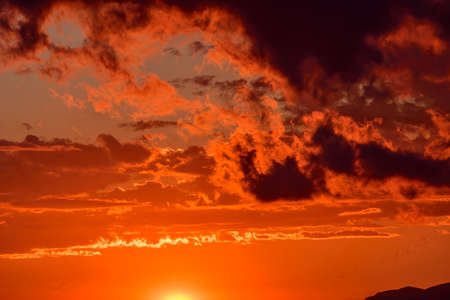 Reddish backgrounds of skies at sunsetの写真素材