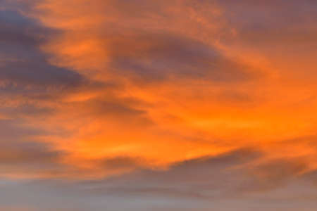 Reddish backgrounds of skies at sunsetの写真素材