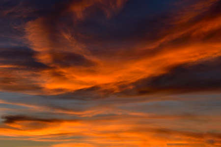 Reddish backgrounds of skies at sunsetの写真素材