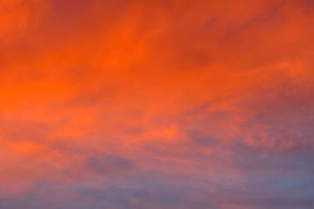 Reddish backgrounds of skies at sunsetの写真素材
