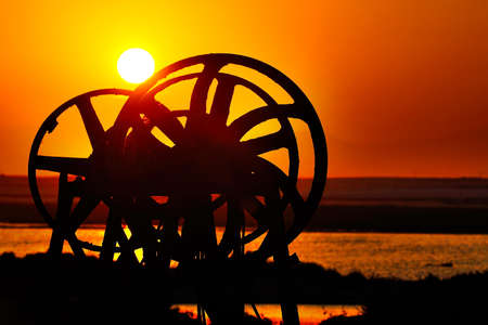 Magnificent sunset in the landscape of the salt flats.の写真素材