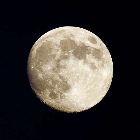Full moon in a clear sky - Night photography.の写真素材