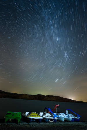 Night photography, on the jetty and the calm waters of a swamp.の写真素材