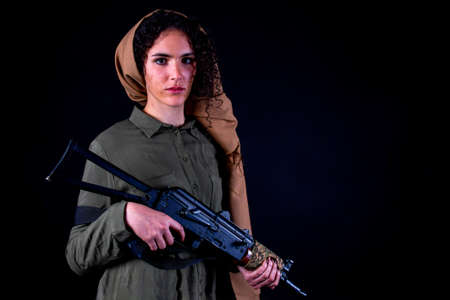 Portrait of a Kurdish guerilla girl.の写真素材