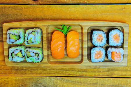Assorted sushi set on slate. Different sushi mixed.の写真素材
