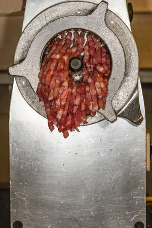 Different types of ingredients and sausages made by hand.の写真素材