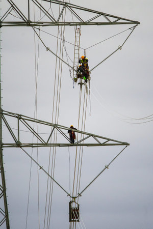 Installation and assembly of high-rise electrical towers.の写真素材