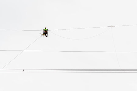 Installation and assembly of high-rise electrical towers.