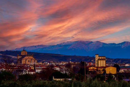 Sunset over the city of Huescar, Granada.の写真素材