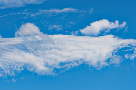 Blue sky background with white clouds