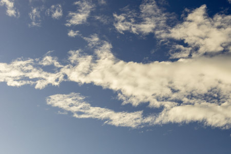 Blue sky background with white clouds