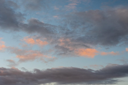 Reddish sky background with orange clouds.
