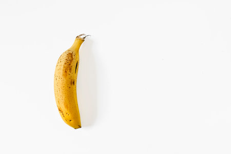 Yellow Canary banana isolated on white background.の写真素材