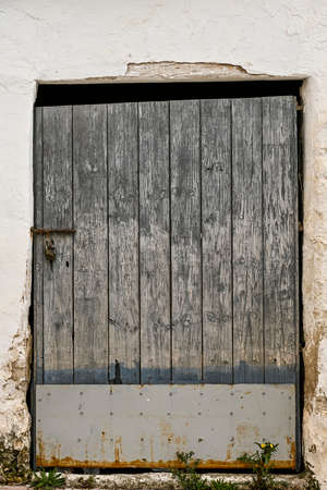 An old and weathered wooden door.の写真素材
