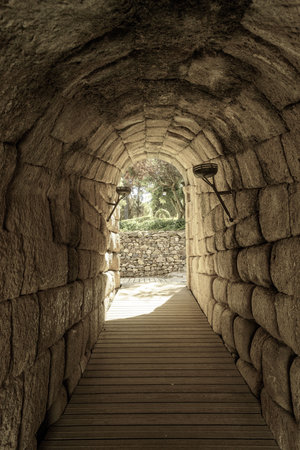A stone corridor within the ancient Roman amphitheater in Merida, Spain.の写真素材