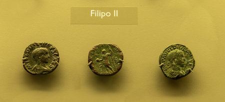 Display of Roman coins from the reign of Emperor Philip II. Featuring detailed portraits and...