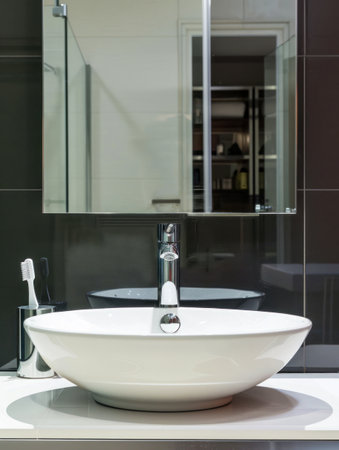 Modern bathroom sink with stylish faucet and wooden countertop. Generative AIの写真素材