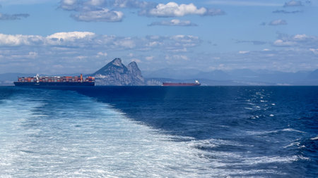 Scenic view of the Strait of Gibraltar with the African coast visible under a clear blue sky.の写真素材