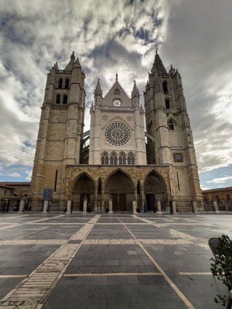 Leon Cathedral's Gothic west facade with rose window and pointed archesの写真素材