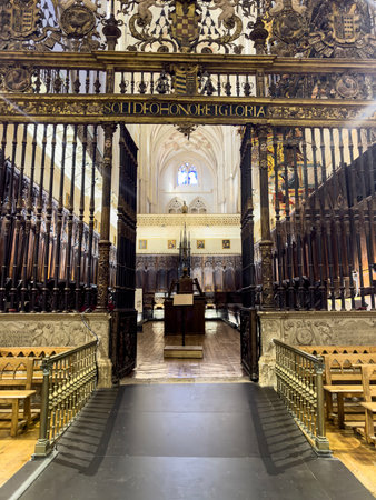 Ornate entrance to the choir with iron fence, golden details and inscription inside Palencia Cathedralの写真素材