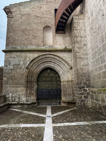 Gothic entrance of San Pedro Church in Fuentes de Nava, Palencia province, with multiple archives...