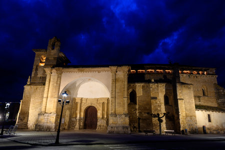 Illuminated facade of San Martin de Tours Church in Fromista at nightの写真素材