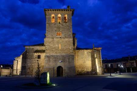 Illuminated facade of San Pedro Church in Fromista at blue hourの写真素材