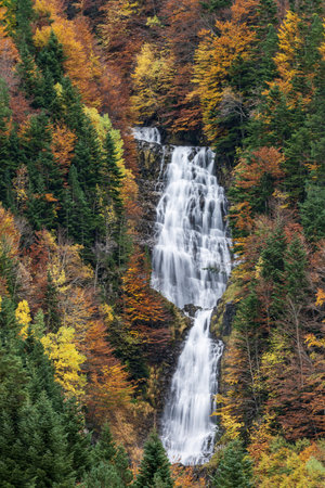 Picturesque high mountain waterfall in the Escusaneta ravine in Bujaruelo, in the Ordesa National Park.の写真素材
