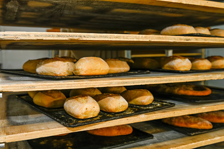 Shelves with fresh bread in bakery