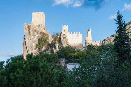 Panoramic view of La Iruela castle on a steep rocky hilltop in Jaen, Spainの写真素材