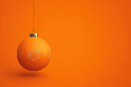 Festive Orange Holiday Bauble Hanging with Sparkle Effectの素材