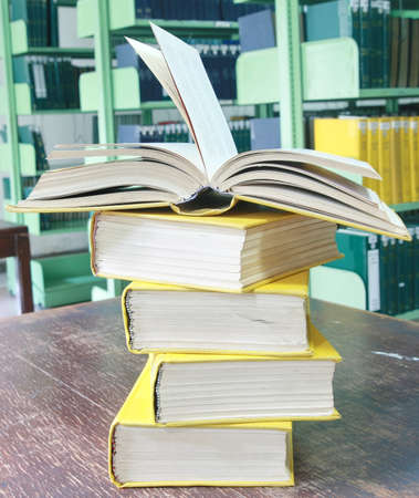 book open on books stack の写真素材