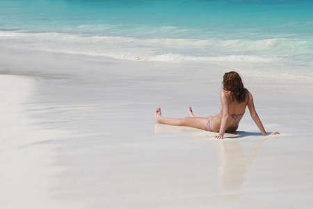 women sunbathing on beachの写真素材